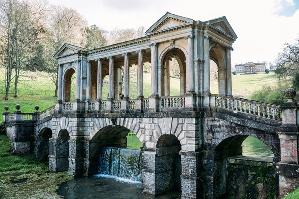 How can you find guided tours of the famous gardens designed by Capability Brown?